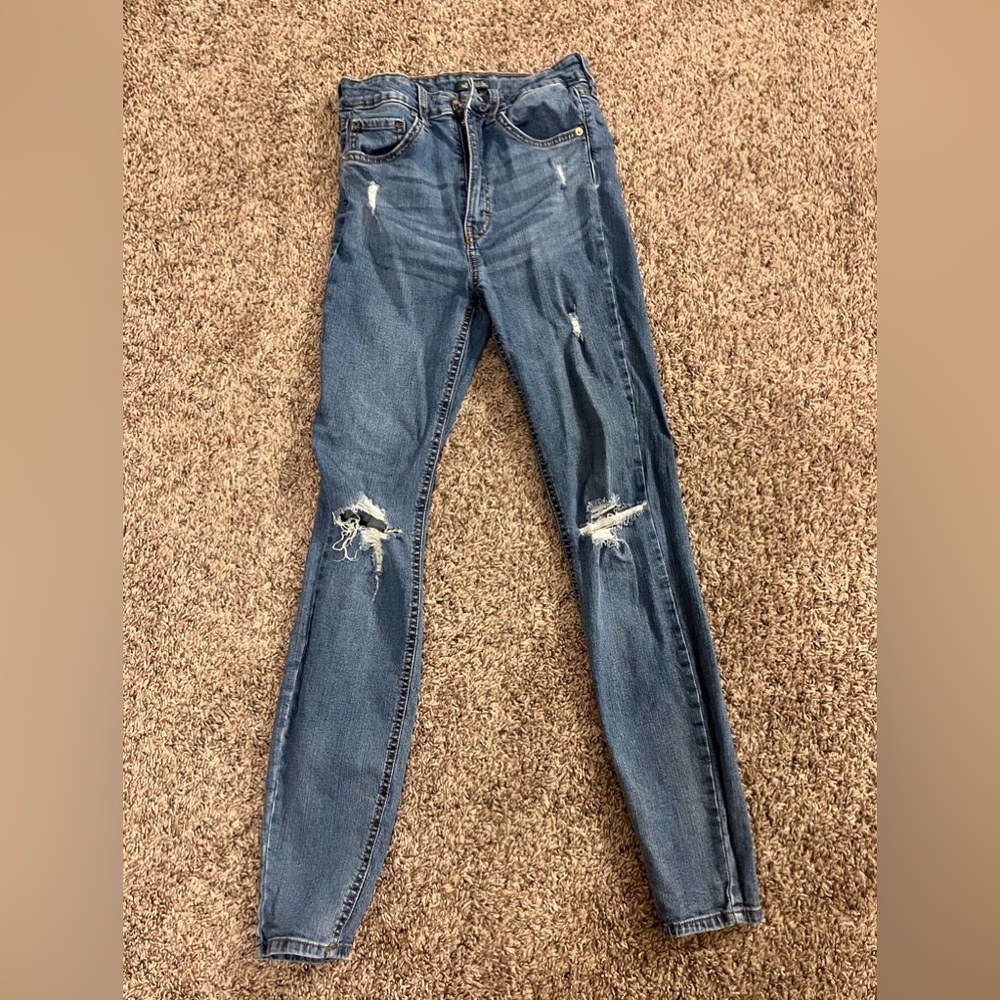 ripped blue jeans